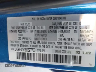 2014 Mazda CX-5 Grand Touring with VIN JM3KE4DY1E0327703, listed as a IAAI auction lot 41755735 with 206,845 mi miles. Bid and sale history available at carsss.com. Image 9.