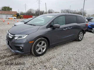 2018 Honda Odyssey EX-L with VIN 5FNRL6H78JB091153, listed as a Copart auction lot 52743715 with 69,849 mi miles and Salvage Title. Bid and sale history available at DreamBid. Image 1.
