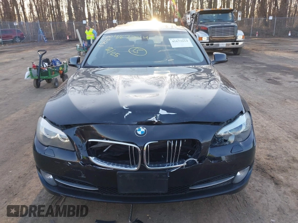 2013 BMW 5 Series 528i xDrive with VIN WBAXH5C58DD107515, listed as a IAAI auction lot 41673214 with 115,726 mi miles. Bid and sale history available at carsss.com. Image 12.