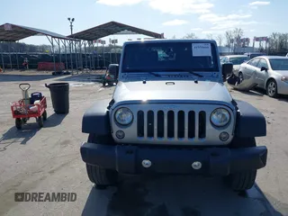 2015 Jeep Wrangler Sport with VIN 1C4GJWAG0FL503254, listed as a IAAI auction lot 41931666 with 115,394 mi miles. Bid and sale history available at carsss.com. Image 12.