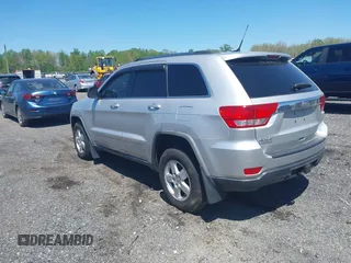 2011 Jeep Grand Cherokee 70th Anniversary with VIN 1J4RR4GG8BC515170, listed as a IAAI auction lot 42135654 with 208,638 mi miles. Bid and sale history available at carsss.com. Image 3.