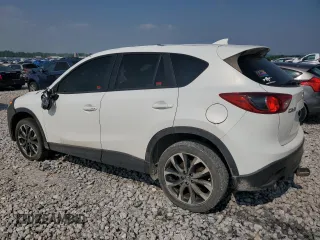 2016 Mazda CX-5 Grand Touring z VIN JM3KE4DY7G0864109, wystawiony jako Copart lot #59635865 z przebiegiem Nie podano mil oraz Czysty tytuł • Clean title. Historia ofert i sprzedaży dostępna na DreamBid. Obrazek 2.