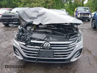 2023 Volkswagen Arteon SEL R-Line z VIN WVWAR7ANXPE010870, wystawiony jako IAAI lot #42246798 z przebiegiem 26 587 mil mil oraz . Historia ofert i sprzedaży dostępna na DreamBid. Obrazek 12.