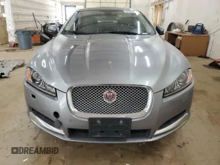 2015 Jaguar XF Portfolio with VIN SAJWJ0FF8F8U65883, listed as a Copart auction lot 55783945 with 133,431 mi miles and Salvage Title. Bid and sale history available at DreamBid. Image 5.