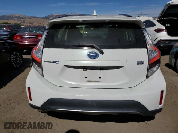 2018 Toyota Prius One with VIN JTDKDTB36J1604525, listed as a Copart auction lot 63838575 with 59,212 mi miles and Salvage title. Bid and sale history available at DreamBid. Image 6.