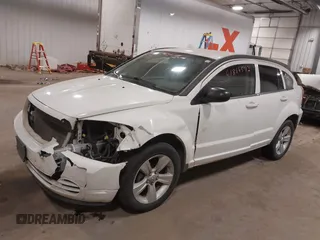 2010 Dodge Caliber SXT with VIN 1B3CB4HA3AD590654, listed as a IAAI auction lot 41814572 with 203,422 mi miles and . Bid and sale history available at DreamBid. Image 18.