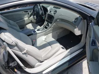 2005 Mercedes-Benz SL 55 AMG with VIN WDBSK74F85F101039, listed as a IAAI auction lot 42812397 with 76,452 mi miles and . Bid and sale history available at DreamBid. Image 5.
