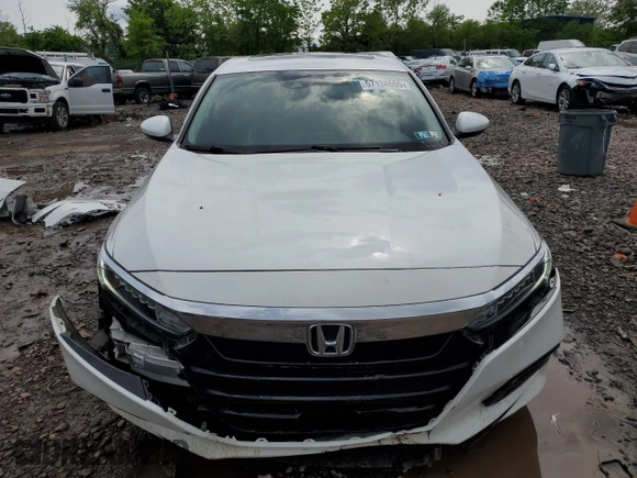 2019 Honda Accord EX z VIN 1HGCV1F4XKA160108, wystawiony jako Copart lot #57134665 z przebiegiem 152 412 mil mil oraz Szkoda całkowita • Salvage title. Historia ofert i sprzedaży dostępna na DreamBid. Obrazek 5.