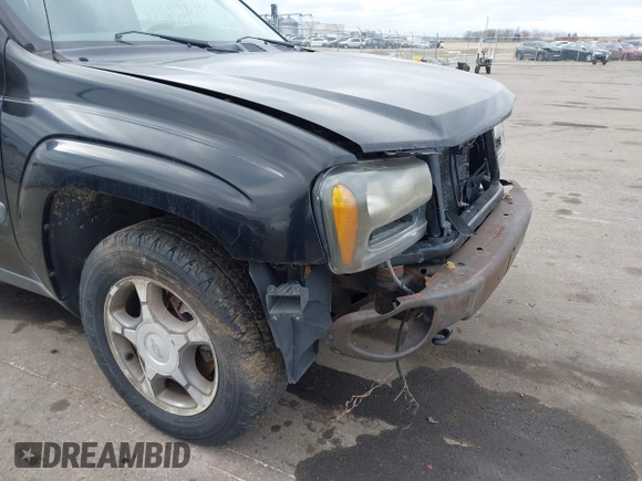 2004 Chevrolet TrailBlazer EXT LT with VIN 1GNET16S746115863, listed as a IAAI auction lot 41453236 with 198,099 mi miles. Bid and sale history available at carsss.com. Image 13.
