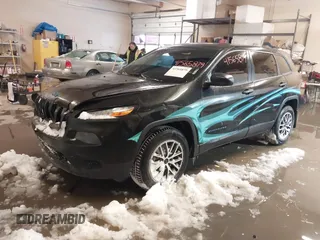 2015 Jeep Cherokee Sport with VIN 1C4PJMAB6FW773953, listed as a IAAI auction lot 41565879 with 242,580 mi miles. Bid and sale history available at carsss.com. Image 18.