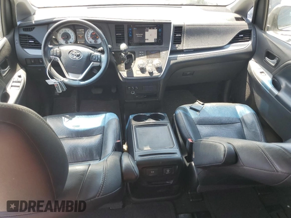2015 Toyota Sienna SE with VIN 5TDXK3DC6FS656949, listed as a Copart auction lot 54114955 with 112,642 mi miles and Salvage Title. Bid and sale history available at DreamBid. Image 8.