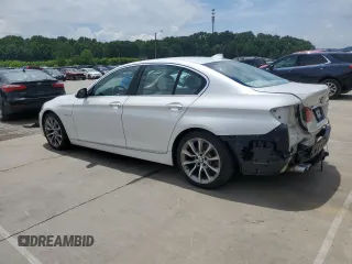 2014 BMW 5 Series 535d xDrive with VIN WBAFV3C57ED685132, listed as a Copart auction lot 60413005 with 94,355 mi miles and Salvage title. Bid and sale history available at DreamBid. Image 2.