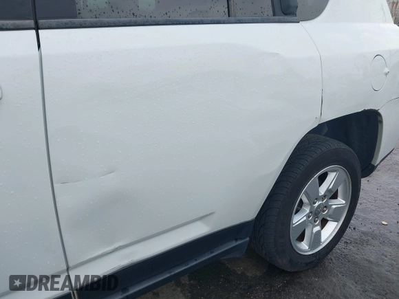 2014 Jeep Compass Altitude with VIN 1C4NJCBA8ED606589, listed as a IAAI auction lot 41939914 with 148,281 mi miles. Bid and sale history available at carsss.com. Image 6.