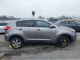 2013 Kia Sportage LX with VIN KNDPBCA23D7529658, listed as a IAAI auction lot 42473877 with 114,797 mi miles and . Bid and sale history available at DreamBid. Image 13.