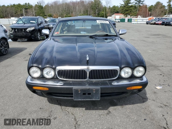 2002 Jaguar XJ 8 with VIN SAJDA14C62LF40435, listed as a Copart auction lot 52022645 with 153,703 mi miles and Salvage title. Bid and sale history available at DreamBid. Image 5.