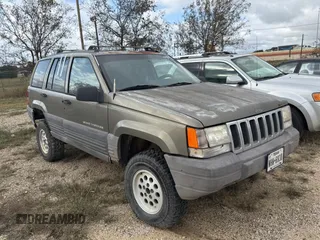 1996 Jeep Grand Cherokee Laredo with VIN 1J4GZ58S9TC161645, listed as a Copart auction lot 85896144 with 0 mi miles and Clean Title. Bid and sale history available at carsss.com. Image 1.
