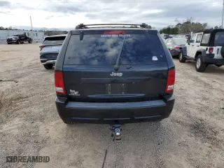 2010 Jeep Grand Cherokee Laredo with VIN 1J4PS4GK7AC117852, listed as a Copart auction lot 89107185 with 167,357 mi miles and Salvage Title. Bid and sale history available at carsss.com. Image 6.