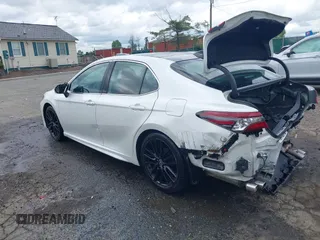 2023 Toyota Camry TRD z VIN 4T1KZ1AK8PU073362, wystawiony jako IAAI lot #42244183 z przebiegiem 103 245 mil mil oraz . Historia ofert i sprzedaży dostępna na DreamBid. Obrazek 3.