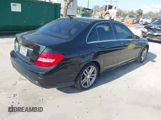 2014 Mercedes-Benz C-Class C 250 Sport with VIN WDDGF4HB3EG250671, listed as a IAAI auction lot 41607910 with 136,556 mi miles. Bid and sale history available at carsss.com. Image 4.