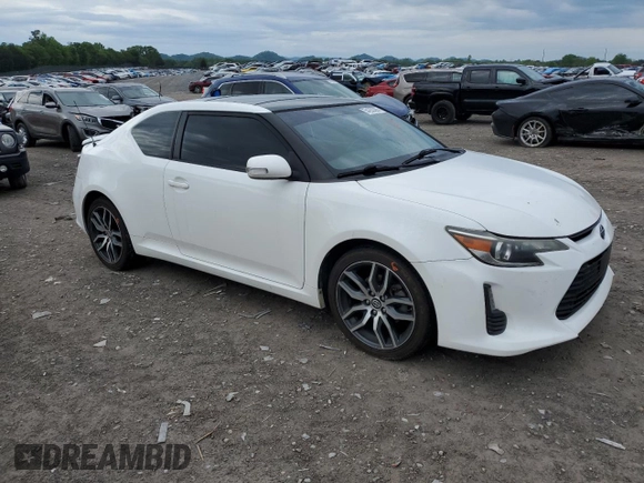 2014 Scion tC z VIN JTKJF5C70E3084411, wystawiony jako Copart lot #54255385 z przebiegiem 152 715 mil mil oraz Szkoda całkowita • Salvage title. Historia ofert i sprzedaży dostępna na DreamBid. Obrazek 4.