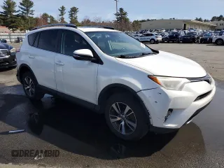 2018 Toyota RAV4 XLE with VIN 2T3WFREV4JW476959, listed as a Copart auction lot 51593265 with 198,596 mi miles and Salvage Title. Bid and sale history available at DreamBid. Image 4.