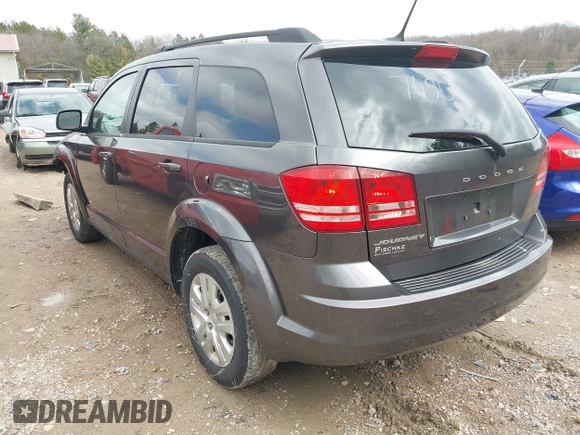 2017 Dodge Journey SE with VIN 3C4PDCAB1HT529623, listed as a IAAI auction lot 42097490 with 175,411 mi miles and . Bid and sale history available at DreamBid. Image 3.