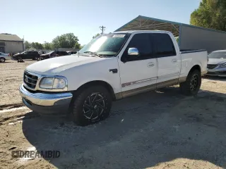 2001 Ford F-150 XLT with VIN 1FTRW07W11KB44405, listed as a Copart auction lot 53560595 with 272,881 mi miles and Salvage title. Bid and sale history available at DreamBid. Image 1.