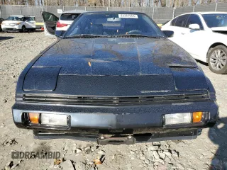 1987 Chrysler Conquest z VIN JJ3CC54N1HZ023316, wystawiony jako Copart lot #83362964 z przebiegiem 196 755 mil mil oraz Szkody całkowita. Historia ofert i sprzedaży dostępna na DreamBid. Obrazek 5.