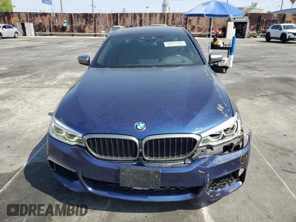 2019 BMW 5 Series M550i xDrive with VIN WBAJB9C51KB464722, listed as a Copart auction lot 53575135 with 70,187 mi miles and Salvage title. Bid and sale history available at DreamBid. Image 5.