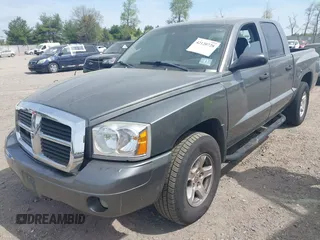 2006 Dodge Dakota SLT with VIN 1D7HE48N06S580705, listed as a IAAI auction lot 42120728 with 206,420 mi miles. Bid and sale history available at carsss.com. Image 2.