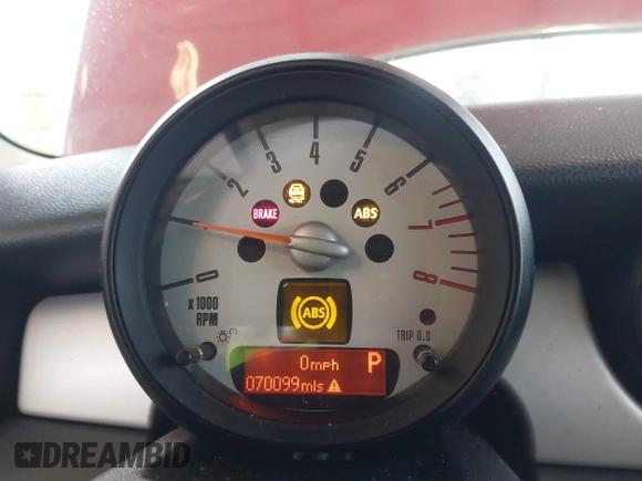 2012 MINI Hardtop with VIN WMWSU3C58CT262077, listed as a IAAI auction lot 42140178 with 70,099 mi miles and . Bid and sale history available at DreamBid. Image 7.