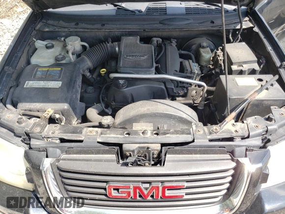 2004 GMC Envoy SLT with VIN 1GKDT13S042281050, listed as a Copart auction lot 60024304 with 267,205 mi miles and Salvage Title. Bid and sale history available at carsss.com. Image 13.