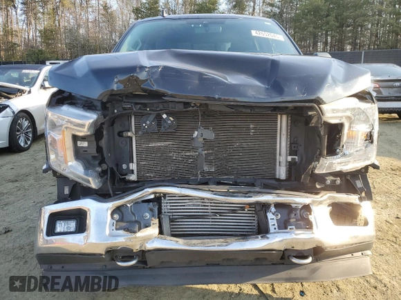 2020 Ford F-150 XL with VIN 1FTEW1EP8LFC00965, listed as a Copart auction lot 42652045 with 92,000 mi miles and Salvage Title. Bid and sale history available at carsss.com. Image 5.