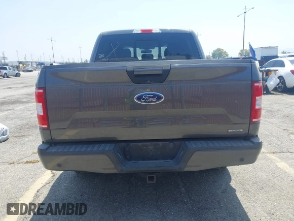 2018 Ford F-150 XL with VIN 1FTEW1CPXJKD56562, listed as a IAAI auction lot 42588371 with 137,496 mi miles and . Bid and sale history available at DreamBid. Image 16.