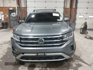 2021 Volkswagen Atlas SEL z VIN 1V2BE2CA6MC203777, wystawiony jako IAAI lot #42507511 z przebiegiem 76 358 mil mil oraz . Historia ofert i sprzedaży dostępna na DreamBid. Obrazek 12.