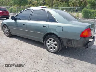 2002 Toyota Avalon XL with VIN 4T1BF28B82U226223, listed as a IAAI auction lot 42085766 with 247,355 mi miles and . Bid and sale history available at DreamBid. Image 3.