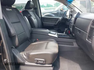 2013 Nissan Titan SV with VIN 1N6AA0EC4DN302479, listed as a IAAI auction lot 42383255 with 112,991 mi miles and . Bid and sale history available at DreamBid. Image 5.
