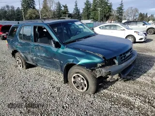 1999 Isuzu Rodeo S with VIN 4S2CM58W7X4359649, listed as a Copart auction lot 83450174 with 171,940 mi miles and Salvage title. Bid and sale history available at DreamBid. Image 10.