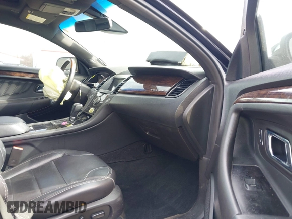 2016 Ford Taurus Limited with VIN 1FAHP2F8XGG130950, listed as a IAAI auction lot 41833038 with 128,536 mi miles and . Bid and sale history available at DreamBid. Image 5.