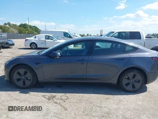2023 Tesla Model 3 with VIN 5YJ3E1EA8PF626235, listed as a IAAI auction lot 42022893 with 30,333 mi miles and . Bid and sale history available at DreamBid. Image 15.