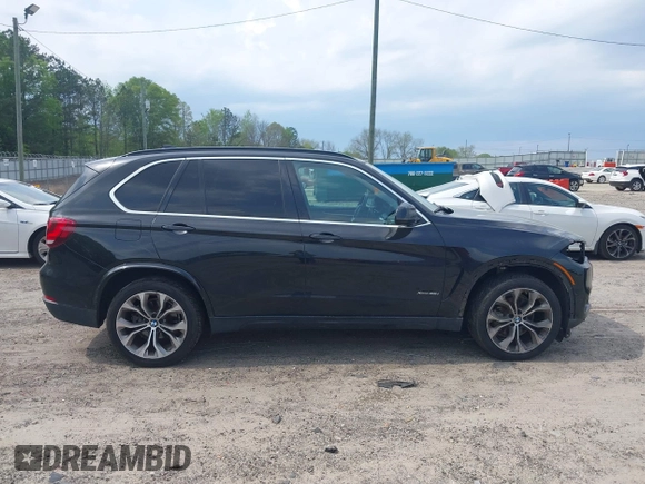 2016 BMW X5 xDrive35i z VIN 5UXKR0C55G0P26466, wystawiony jako IAAI lot #42005793 z przebiegiem 200 889 mil mil oraz . Historia ofert i sprzedaży dostępna na DreamBid. Obrazek 13.