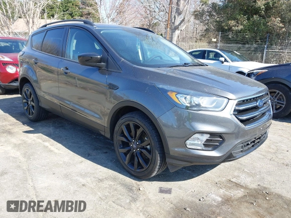2017 Ford Escape SE with VIN 1FMCU9GD9HUC84906, listed as a IAAI auction lot 41762989 with 147,721 mi miles. Bid and sale history available at carsss.com. Image 1.