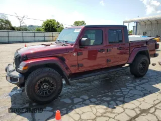 2021 Jeep Gladiator 80th Anniversary с VIN 1C6HJTAG5ML598725, выставлен на аукционе Copart как лот 61992795 с пробегом 54 174 миль миль и Списание • Salvage title. История ставок и продаж доступна на DreamBid. Изображение 1.