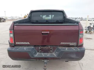2014 Honda Ridgeline RTL with VIN 5FPYK1F52EB010700, listed as a IAAI auction lot 41490401 with 180,947 mi miles. Bid and sale history available at carsss.com. Image 16.