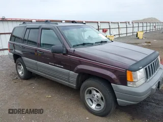 1998 Jeep Grand Cherokee Laredo with VIN 1J4GZ58Y7WC128216, listed as a IAAI auction lot 42791892 with 186,162 mi miles and . Bid and sale history available at DreamBid. Image 1.