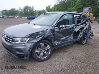 2021 Volkswagen Tiguan SE z VIN 3VV2B7AXXMM070228, wystawiony jako IAAI lot #42295644 z przebiegiem 89 576 mil mil oraz . Historia ofert i sprzedaży dostępna na DreamBid. Obrazek 2.