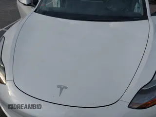 2022 Tesla Model 3 with VIN 5YJ3E1EA9NF375335, listed as a IAAI auction lot 41676024 with 18,836 mi miles. Bid and sale history available at carsss.com. Image 10.