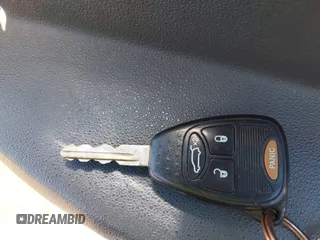 2008 Chrysler Sebring Touring z VIN 1C3LC56K58N267552, wystawiony jako IAAI lot #42273582 z przebiegiem 137 007 mil mil oraz . Historia ofert i sprzedaży dostępna na DreamBid. Obrazek 11.