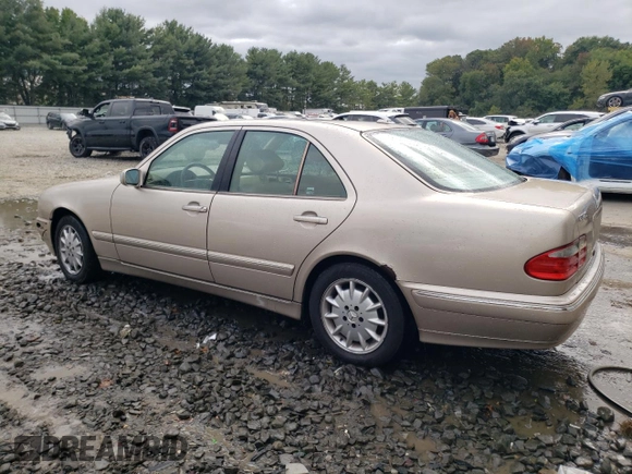 2001 Mercedes-Benz E-Class with VIN WDBJF65J01B389296, listed as a Copart auction lot 71933404 with 124,392 mi miles and Salvage Title. Bid and sale history available at carsss.com. Image 2.