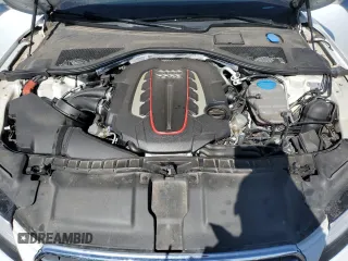2014 Audi S7 Prestige z VIN WAUW2AFC4EN051777, wystawiony jako Copart lot #53831895 z przebiegiem 81 841 mil mil oraz Szkoda całkowita • Salvage title. Historia ofert i sprzedaży dostępna na DreamBid. Obrazek 11.